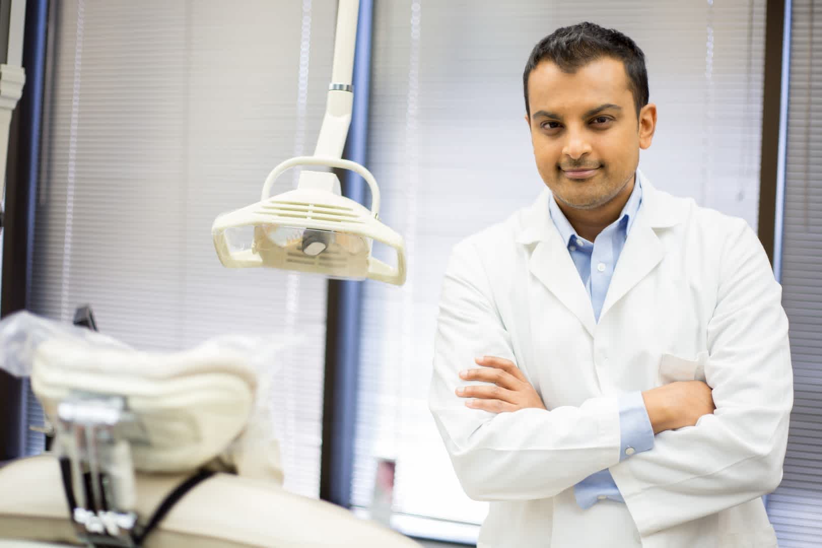 Dentist consulting with a patient